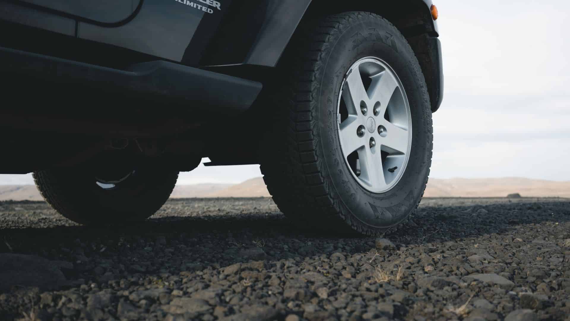 black jeep wrangler on rocks