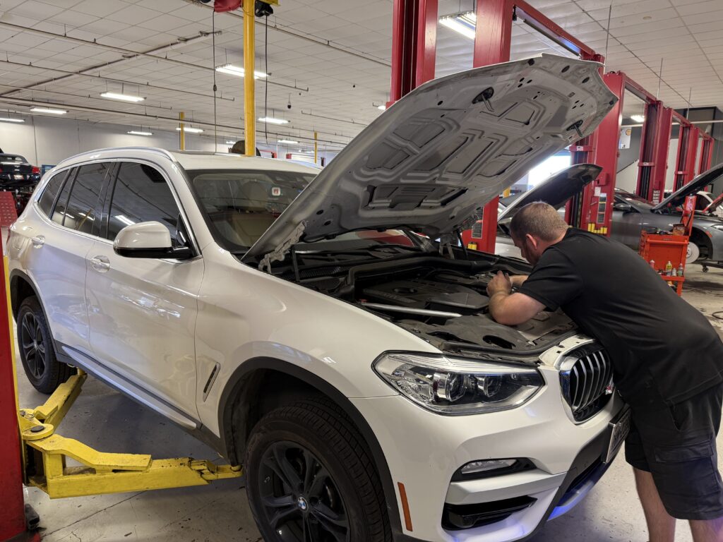 Technician working on BMW repair in Fort Worth, TX